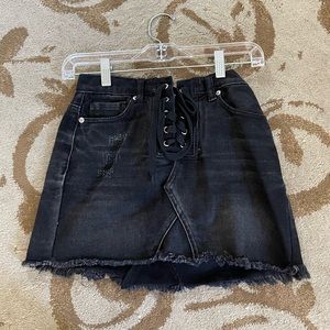 Black denim mini skirt with corset detailing